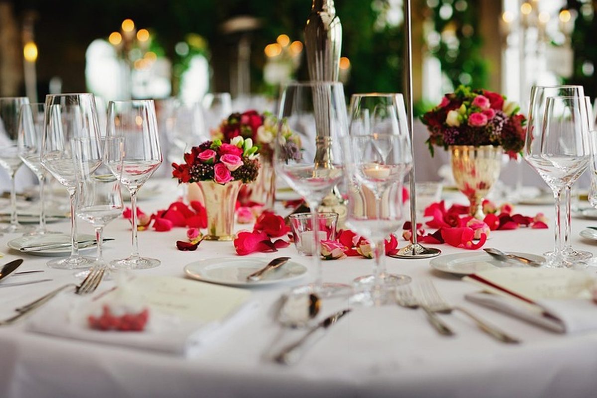 Elegantly styled banquet table prepared by the Casino Moments production team